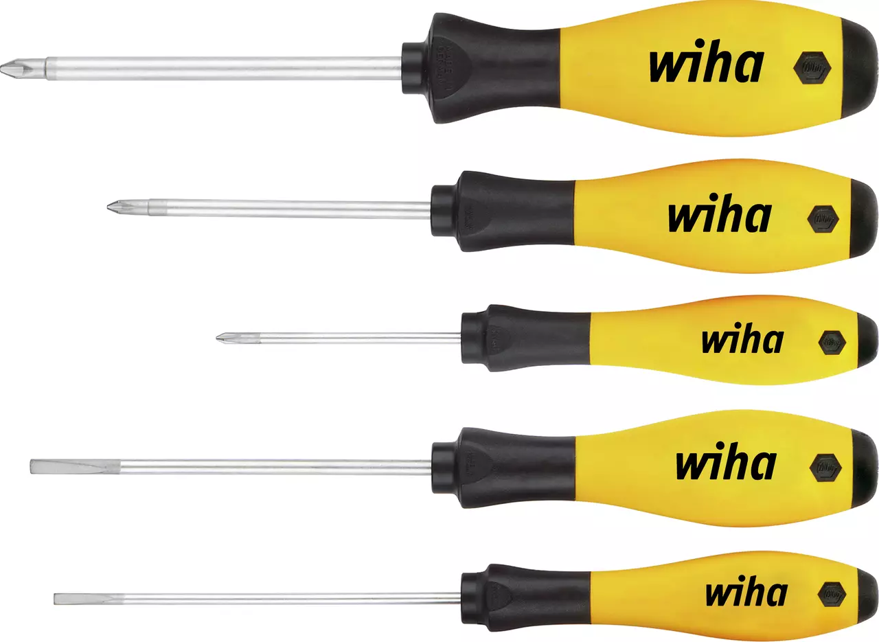 Set of four screwdrivers with yellow and black handles, arranged in a row