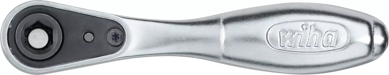 Silver ratchet wrench with black mechanism and engraved handle.