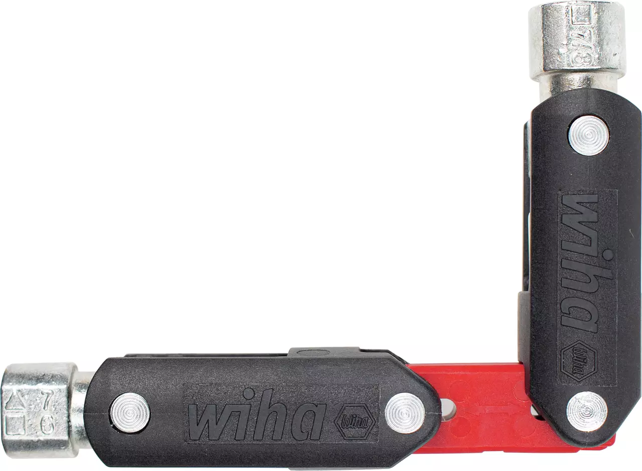 Universal key with black handles and metal ends in an L-shape, connected by a red hinge.