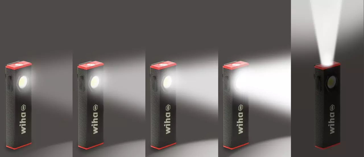 Black and red handheld flashlight with multiple light modes
