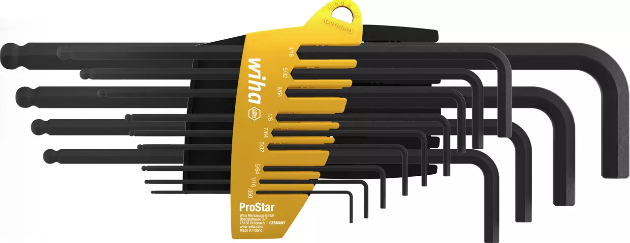 Set of black L-shaped hex keys in a yellow holder.