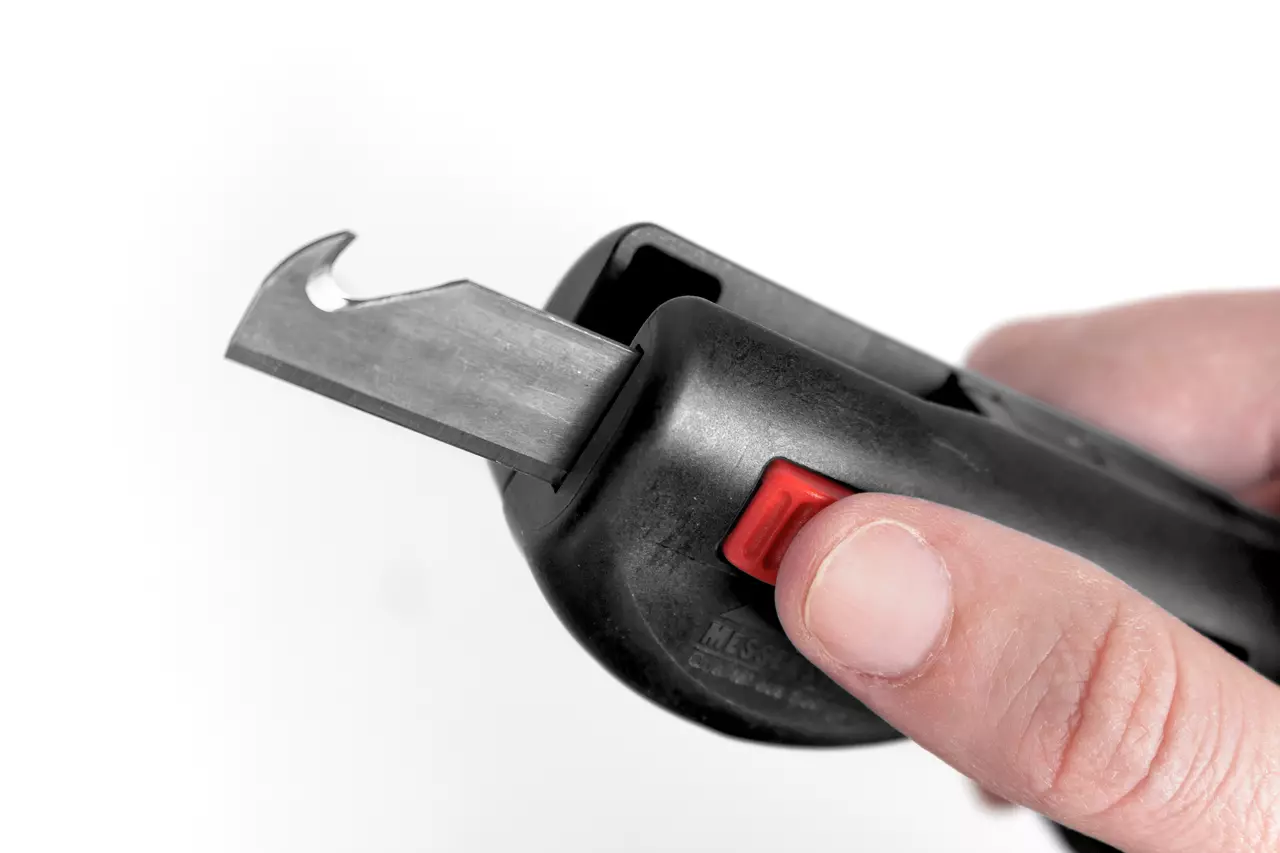 Multifunctional stripping tool with black handle and red button