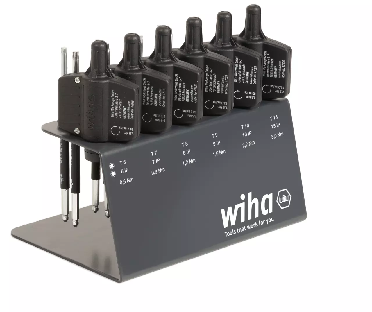 Torque screwdriver set with black handles and metal stand