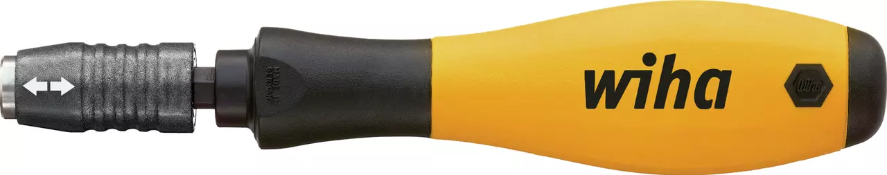 Yellow and black screwdriver with a soft grip handle and bit holder