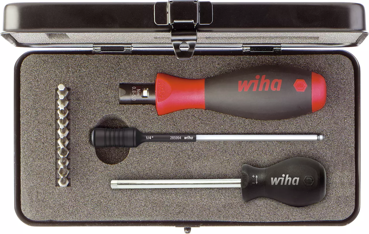 Torque screwdriver set in a case with bits and handles.