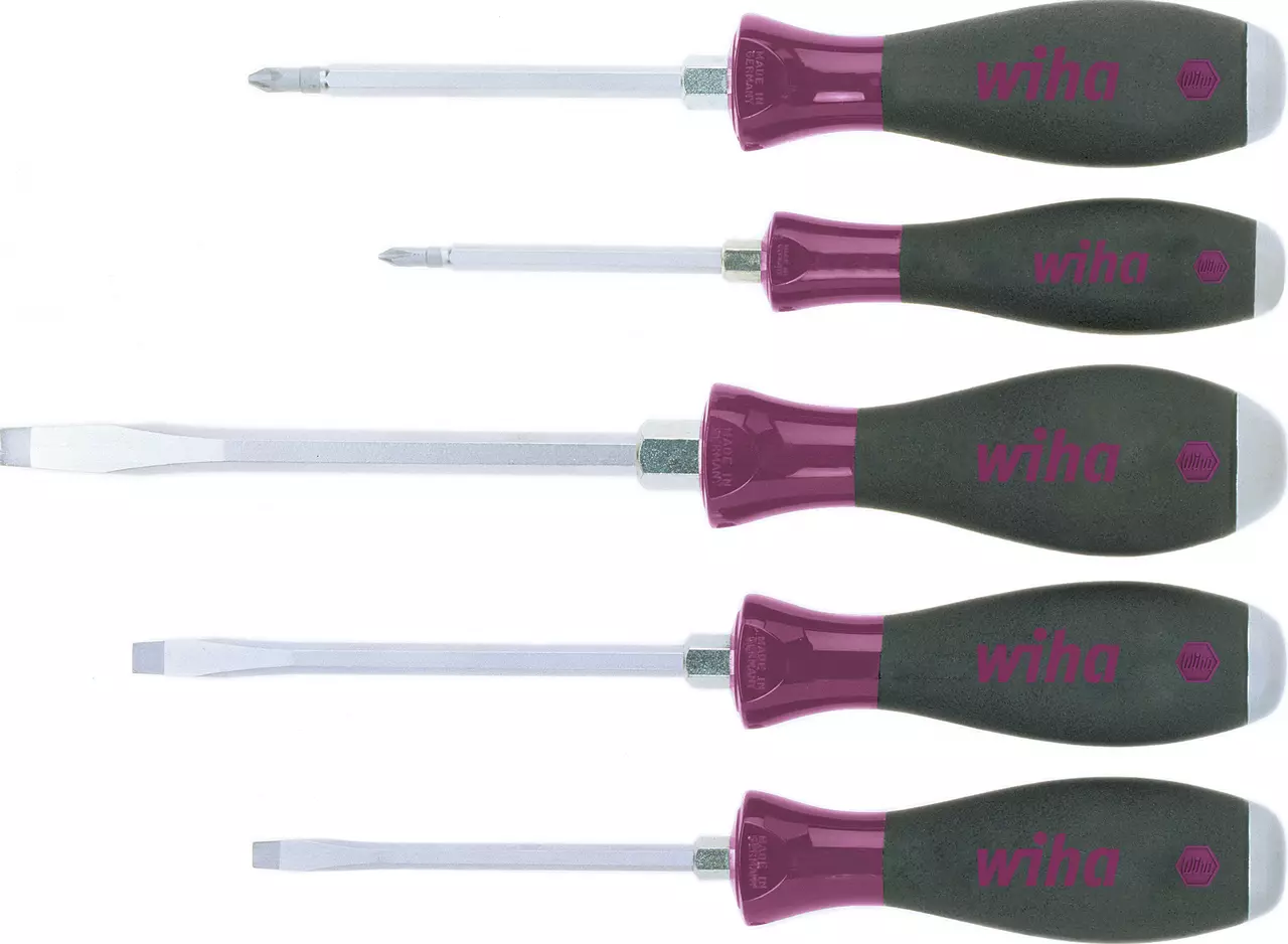 Five screwdrivers with purple and black handles in a row.