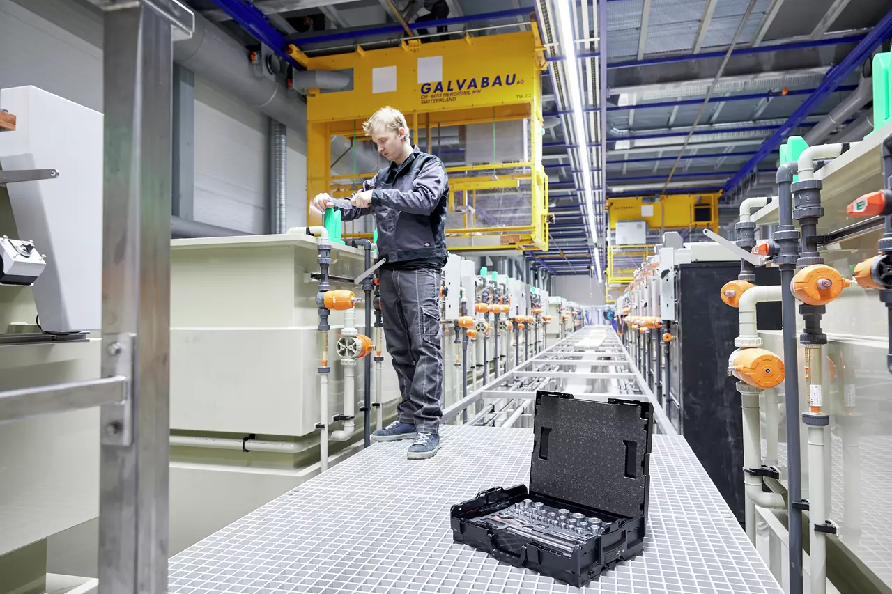 Person working with industrial equipment