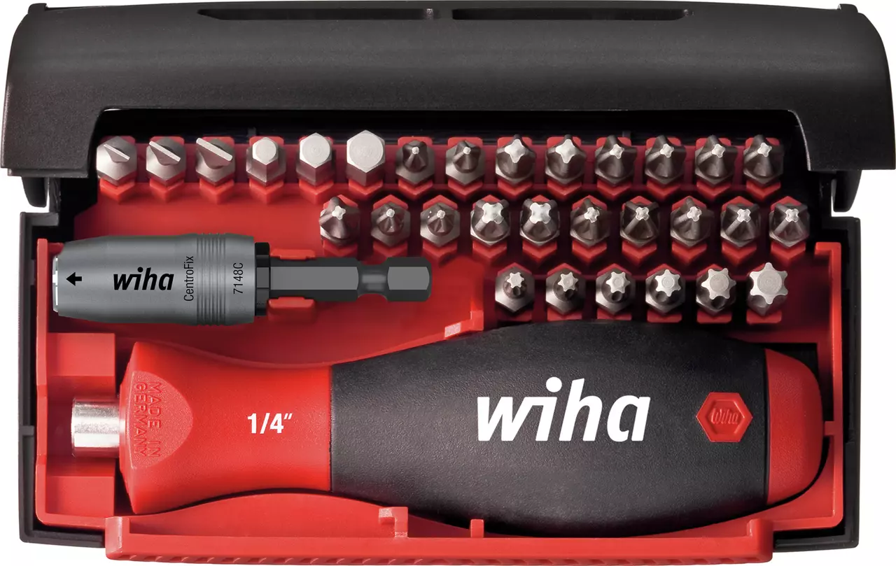 Screwdriver set with black handle and various metal bits in a red and black case.