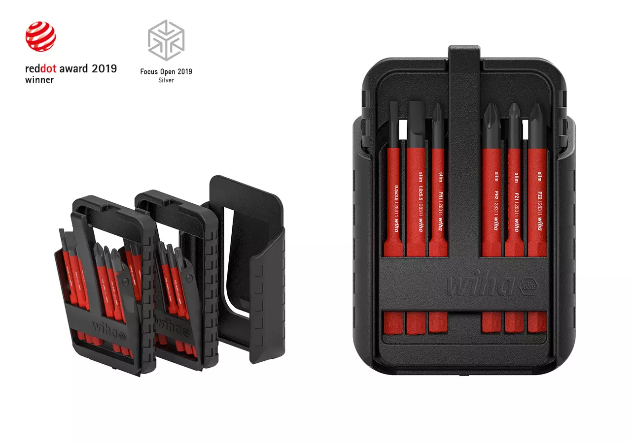 Compact black and red tool bit set in a case, labeled with awards