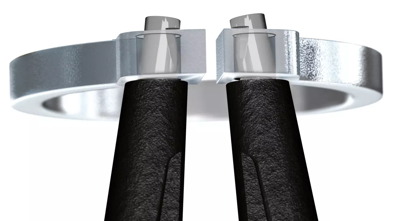 Snap ring pliers with black handles holding a metal ring