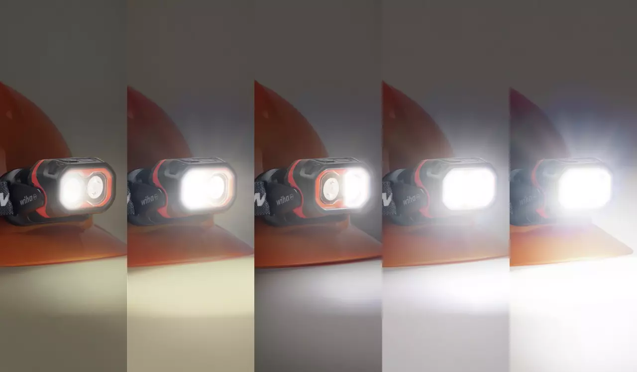 Headlamp with five brightness levels on an orange helmet