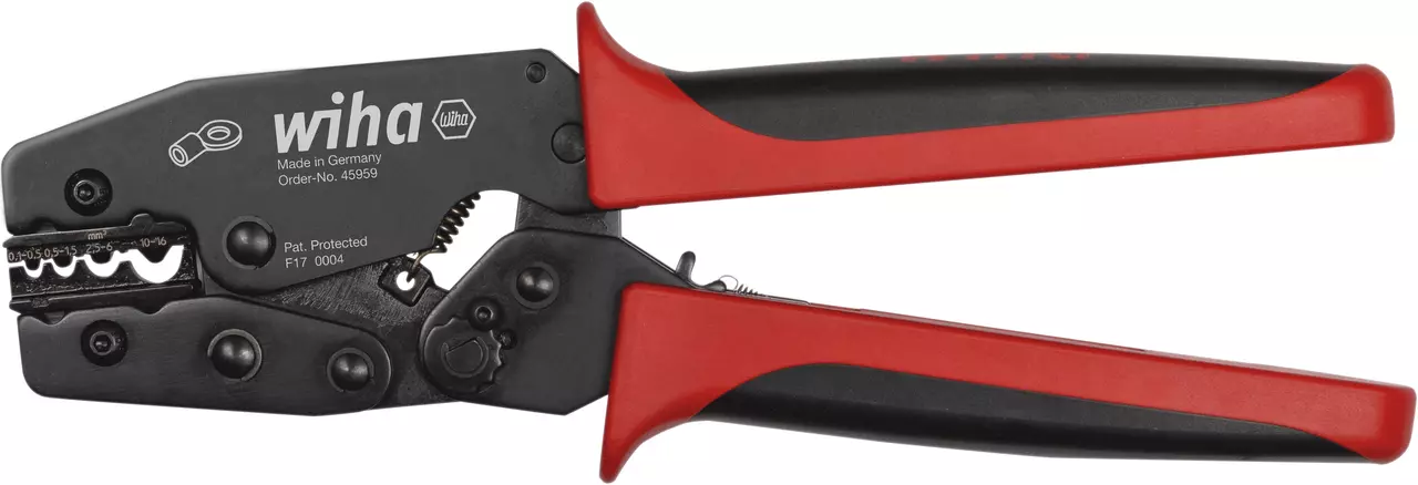 Crimping tool with black metal jaws and red handles.
