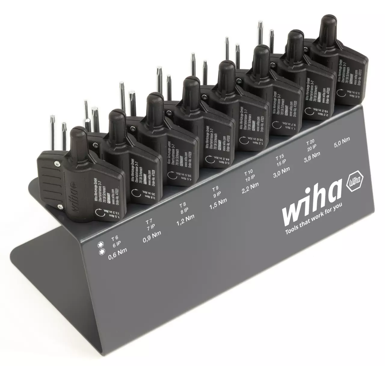 Set of black torque tools on a gray stand with various Nm ratings and sizes.
