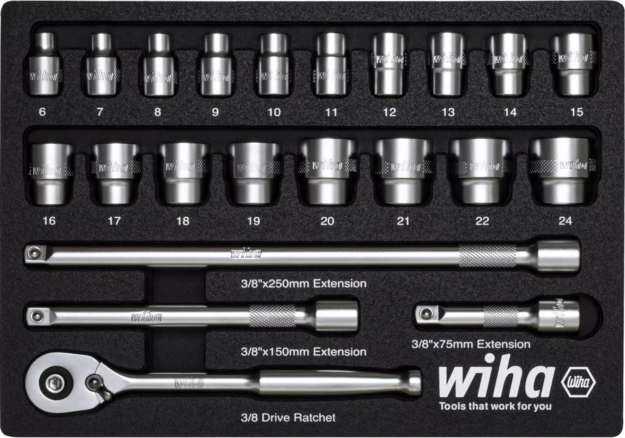 Ratchet wrench set with sockets and extensions in foam insert.