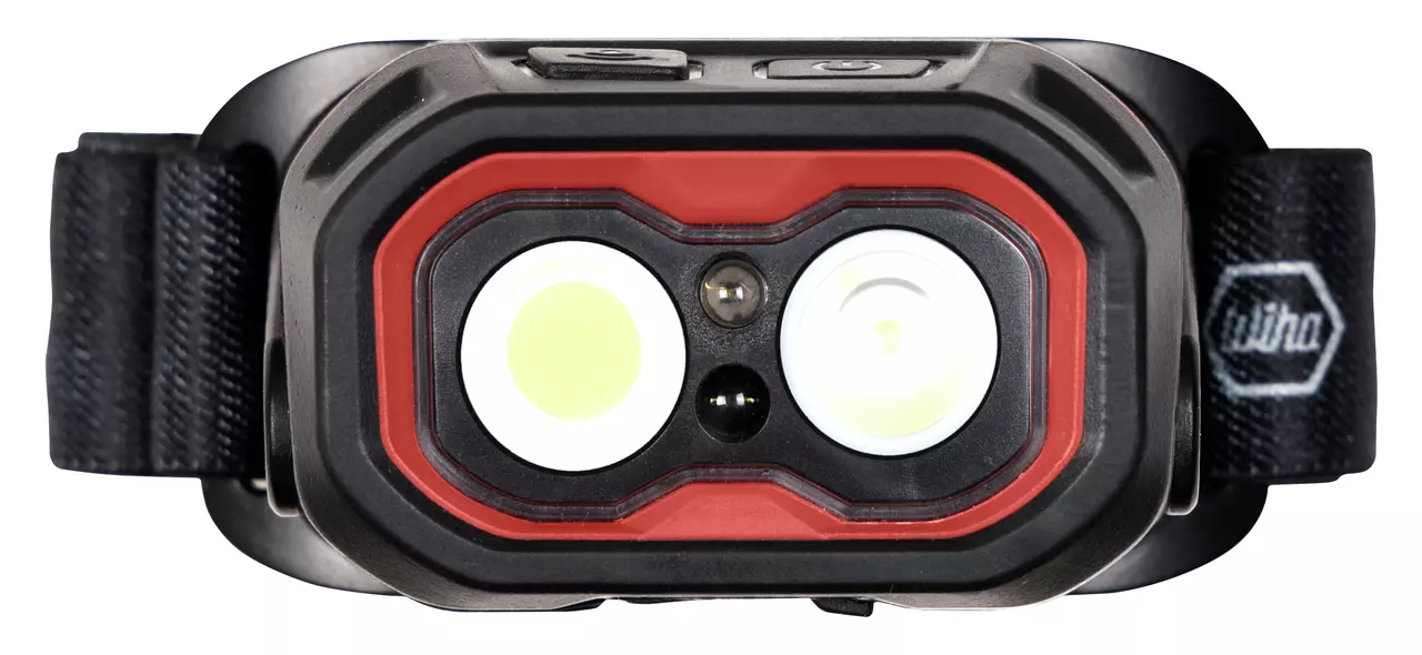 Black and red headlamp with dual LED lights and adjustable strap.