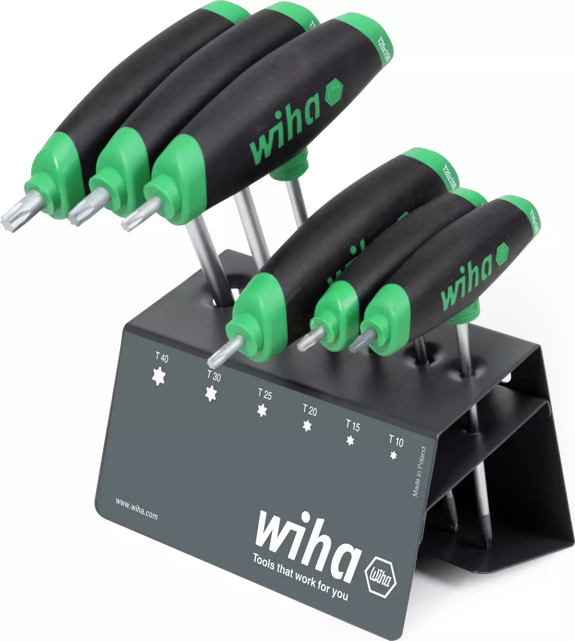 Set of six Torx screwdrivers with black and green handles on a metal stand.