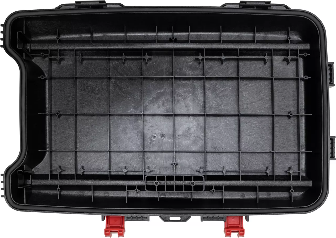 Black plastic toolbox lid with grid pattern and two red latches at the bottom.