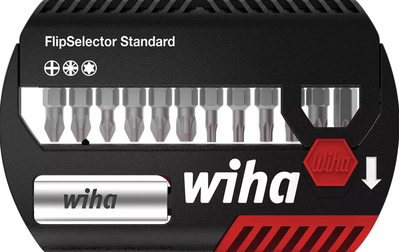 Screwdriver bit set with multiple interchangeable bits in a black and red plastic case.