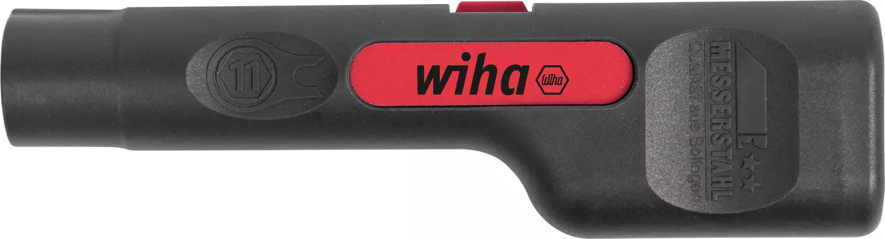 Coaxial stripping and assembly tool with black and red handle.
