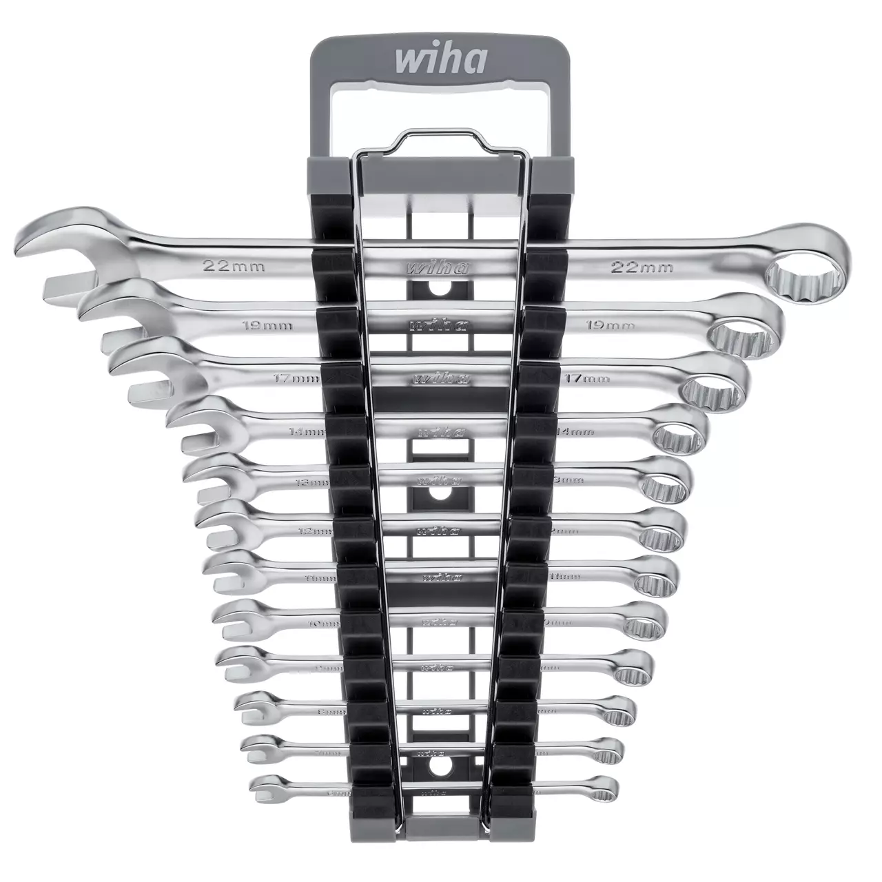 Set of open-end and ring spanners in a holder, various sizes visible