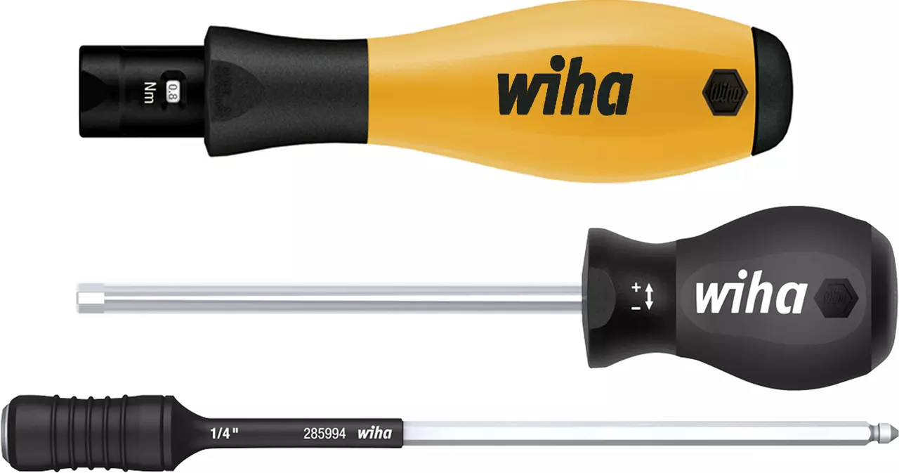Torque screwdriver with black and yellow handle, visible torque settings on handle.